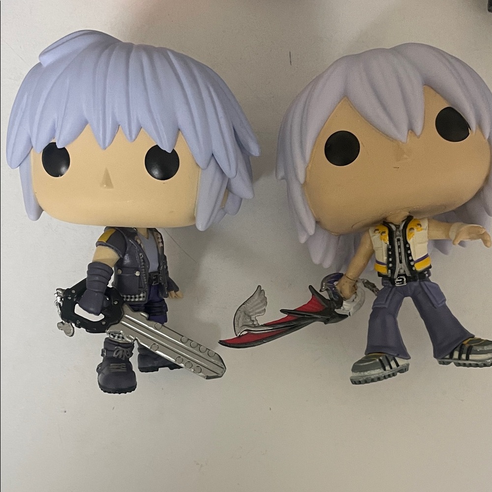 Funko Action Figures with Silver and Black Details